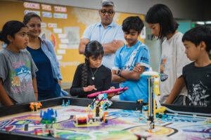 FLL students working together on a robotics project